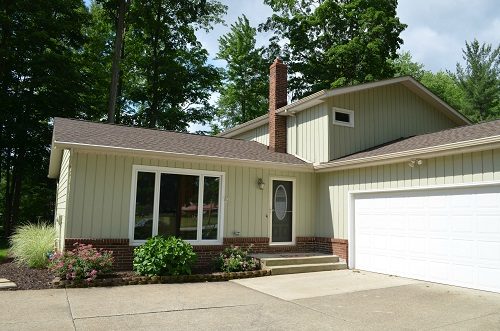 Exterior painting by CertaPro house painters in Solon, OH