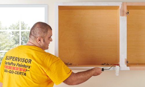 Paint or Stain is Applied to Mounted Cabinets