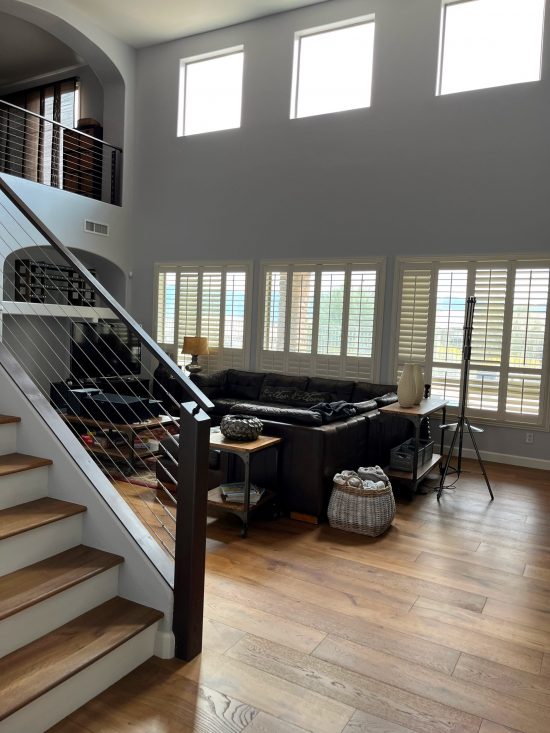 interior stair railing and living room