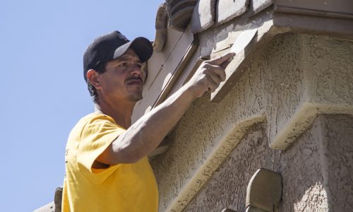 prepping stucco for power washing