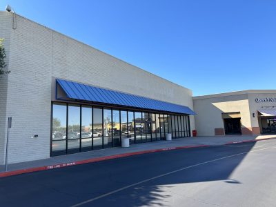 front of store covered up commercial hobby lobby sign shadow