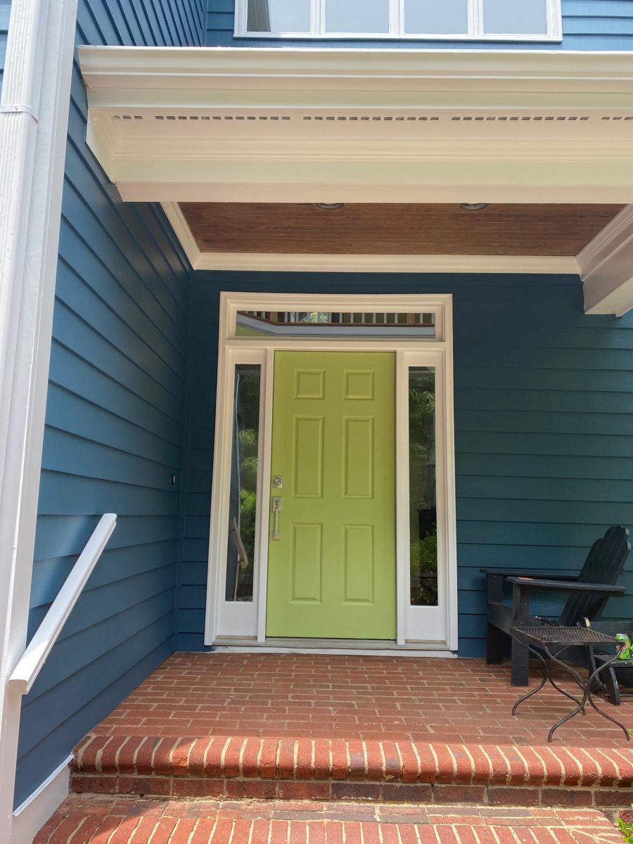 Front door painted yellow by certapro painters of chapel hill
