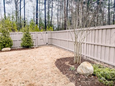 backyard fence after painting in NC