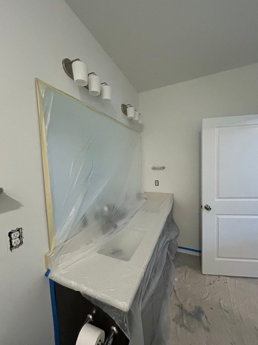 bathroom with protective plastic on vanity Preview Image 1