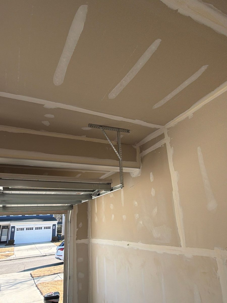 unpainted drywall in garage Preview Image 4