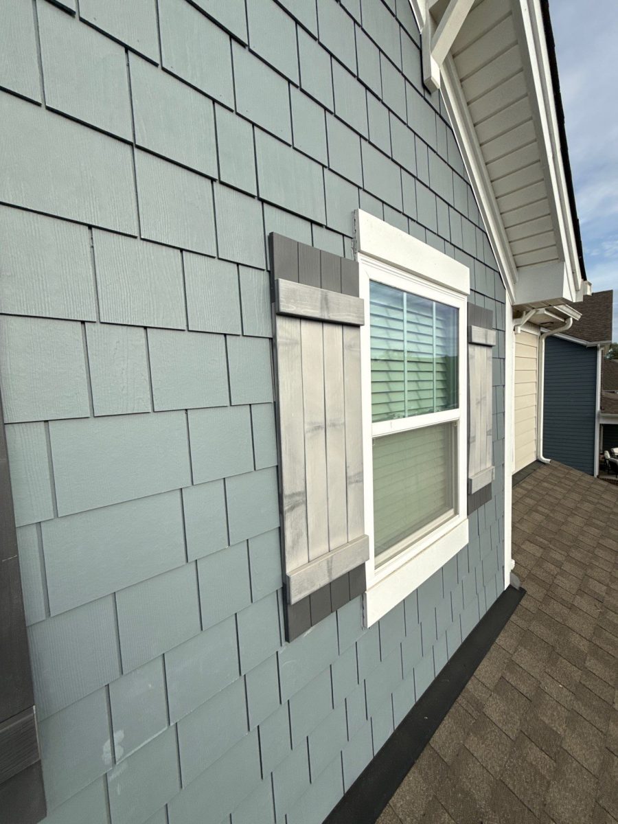 worn grey blue siding and shutters Preview Image 3