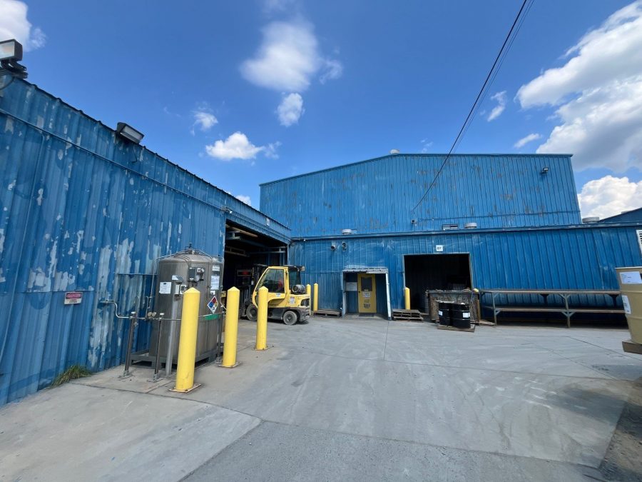 industrial facility with chipped and faded blue paint Preview Image 5