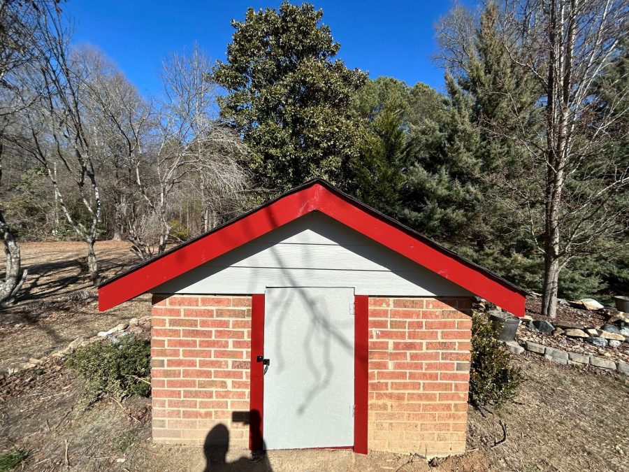 brick well house with red painted trim Preview Image 3