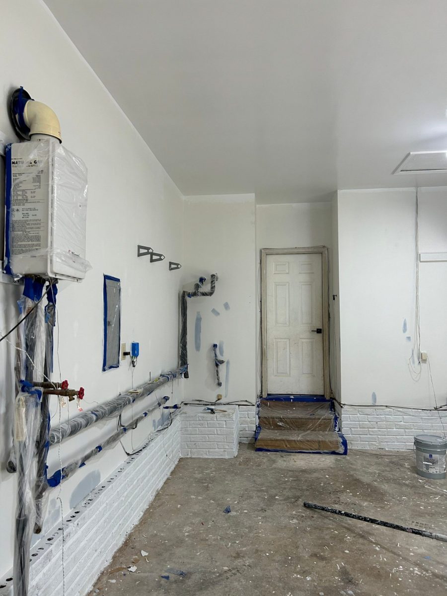 home garage with exposed pipes wrapped in protective plastic Preview Image 1