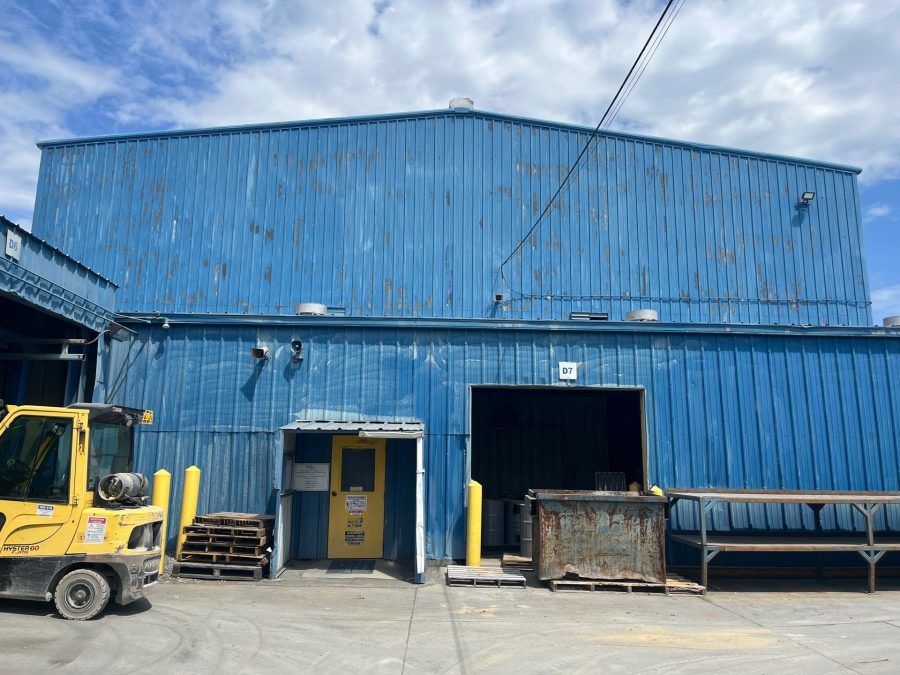 industrial facility with chipped and faded blue paint Preview Image 4