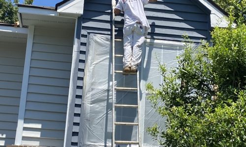 Siding and Soffit Getting Painted
