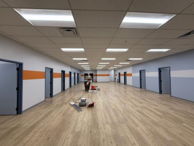 commercial space interior with orange and blue styled paint