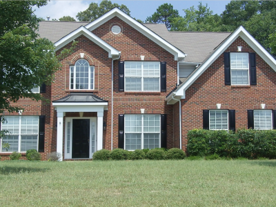 shutter and trim painting brick home