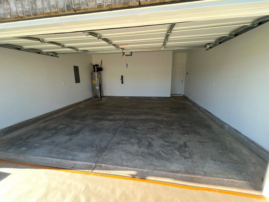 empty garage with ground concrete floor before coating installation Preview Image 4