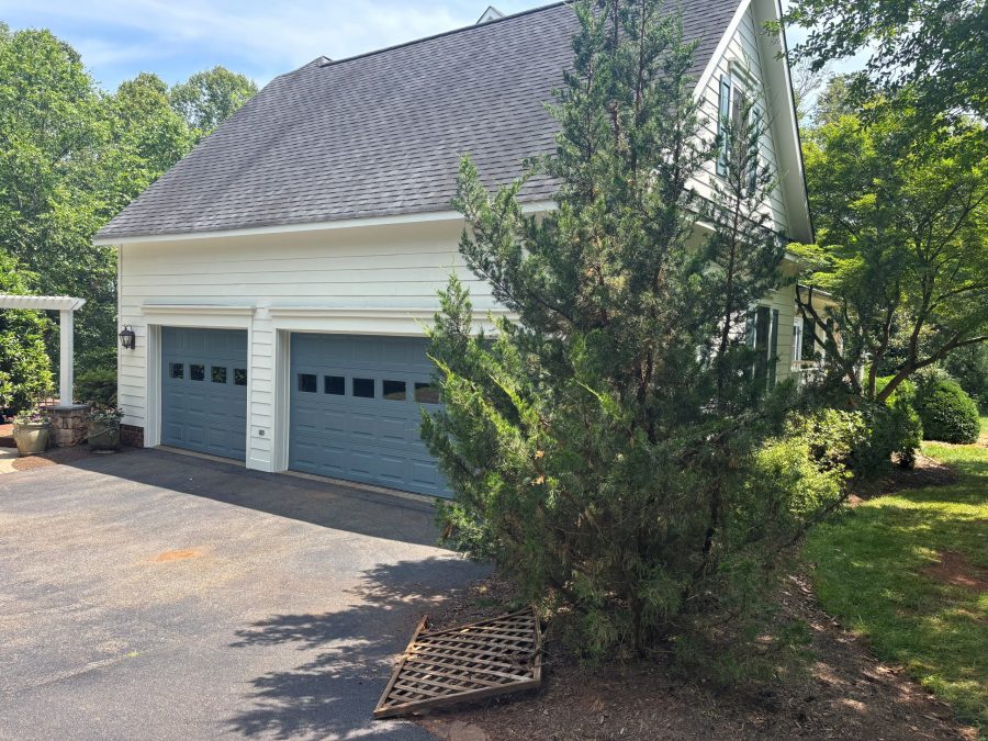two door garage with white painted siding Preview Image 3