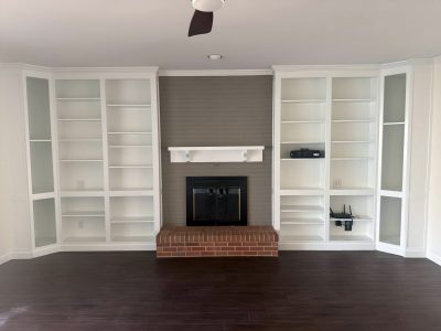 living room wall with built in shelving