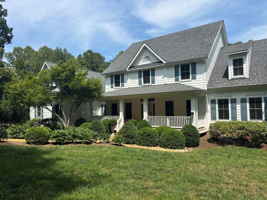 street view of house with white painted siding and blue shutters Preview Image 1