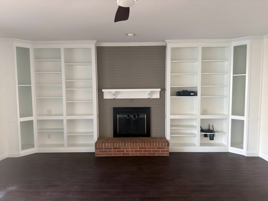 living room wall with built in shelving