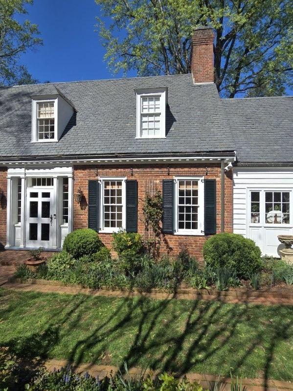 brick home exterior with painted trim and shutters Preview Image 1