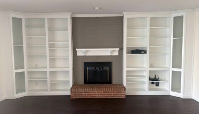 living room wall with built in shelving