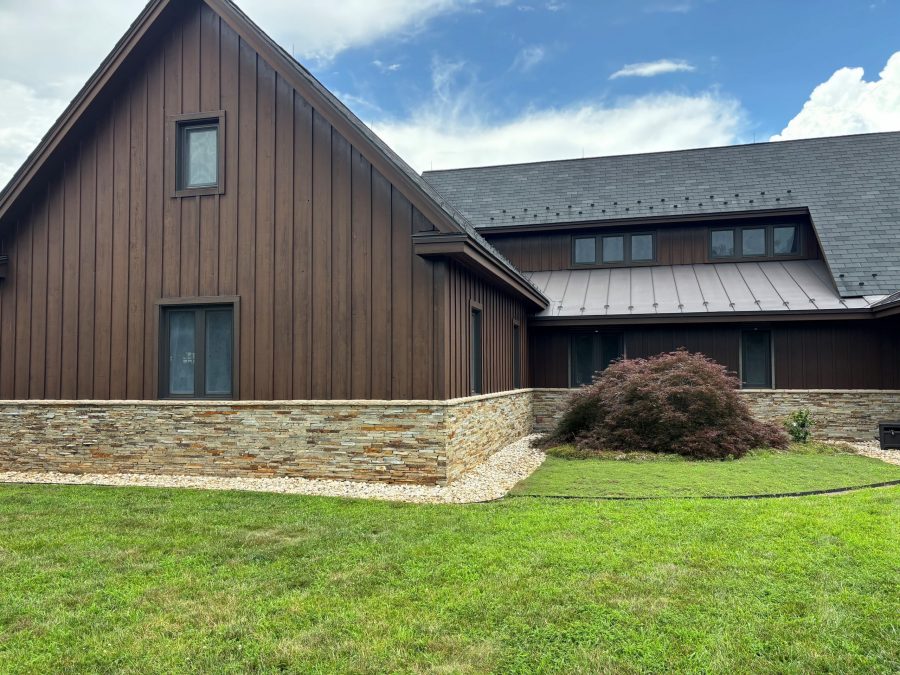 barn style home exterior with brown siding Preview Image 4