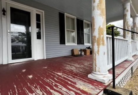 worn paint of home's front porch