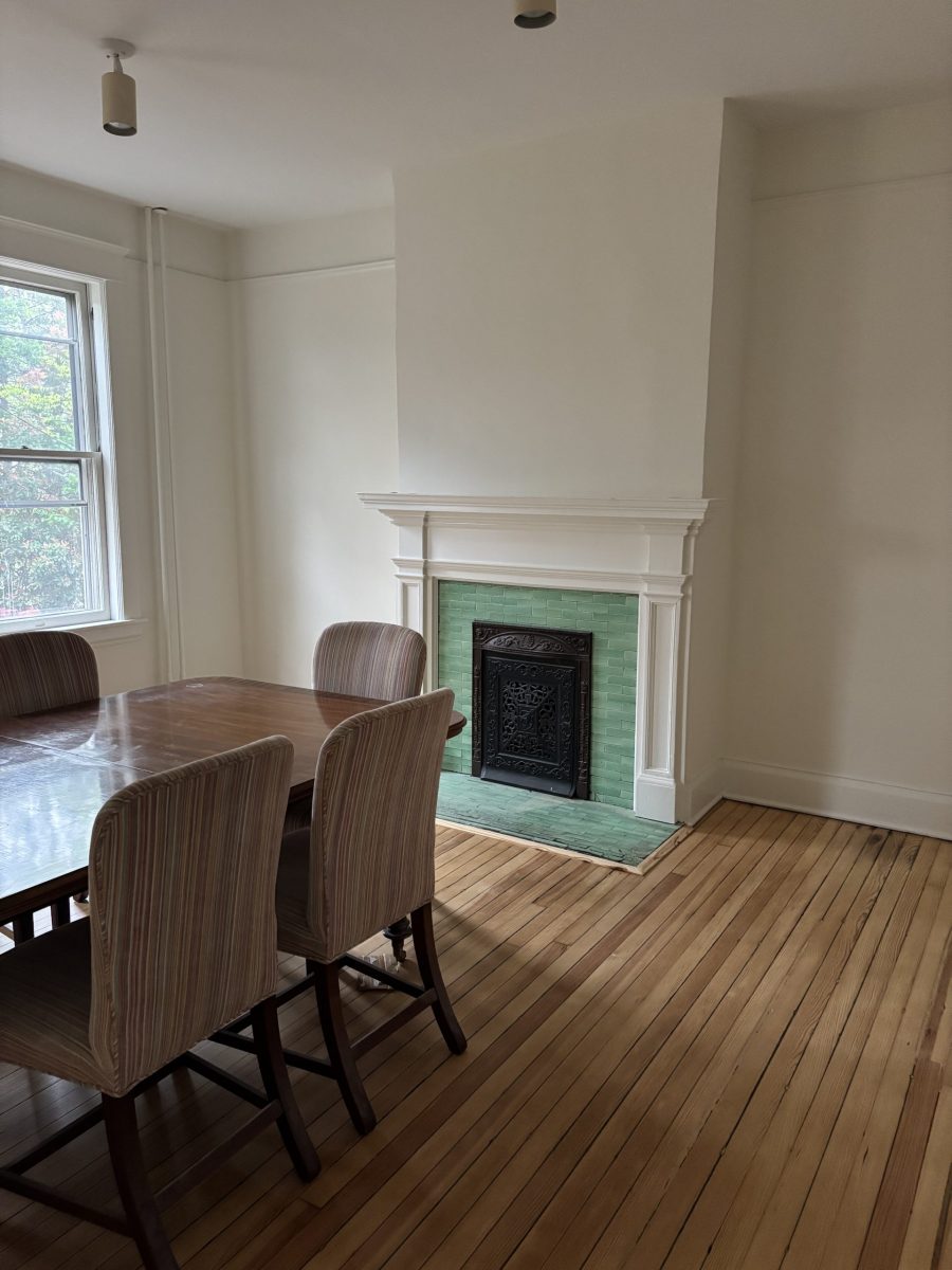 room with dining table and fireplace Preview Image 1