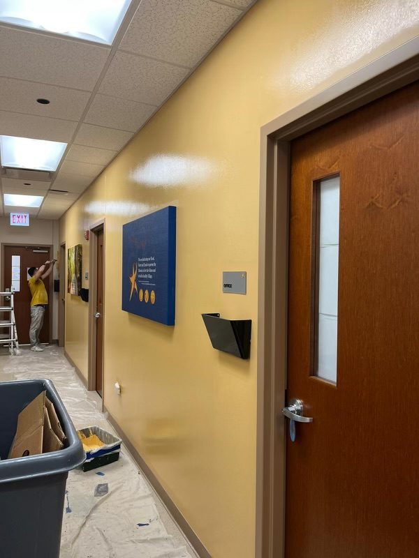 yellow painted wall at doctor's office hallway Chicago Preview Image 2