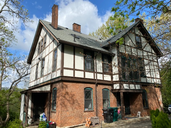 Clifton stucco home project before side of house