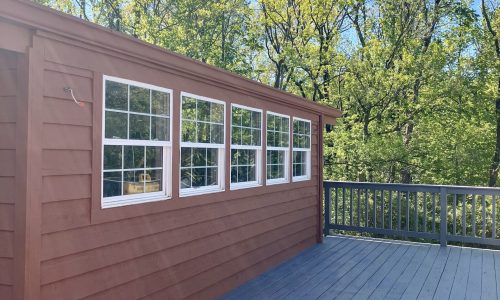 Repaired, Stained and Painted Deck & Siding