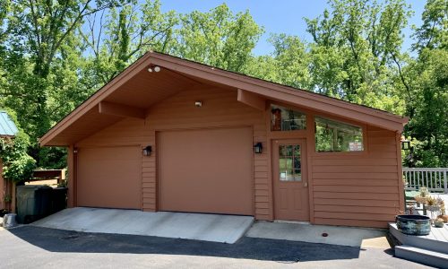 Repaired, Stained and Painted Garages & Siding