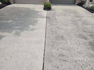 Driveway powerwashing in Cincinnati clean and dirty example