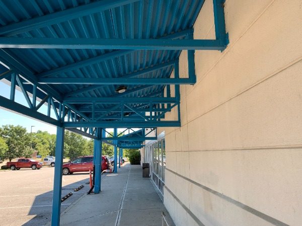 Commercial Exterior Painting Project Before Photo in Florence Kentucky. View of awning walkway. Preview Image 4