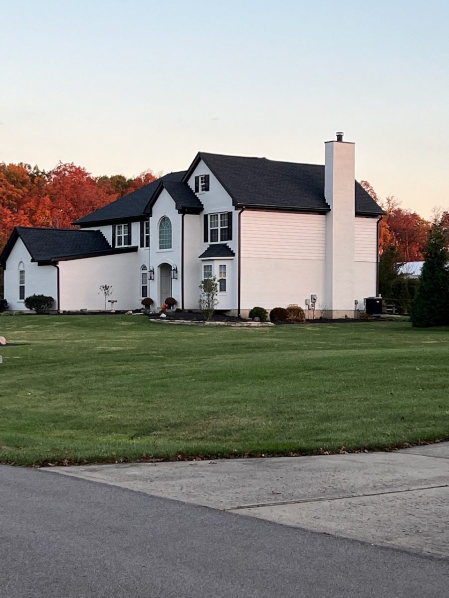 full view of large house from street Preview Image 5