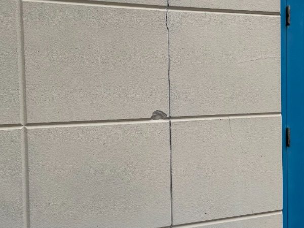 Commercial Exterior Painting Project Before Photo in Florence Kentucky. View of damage on wall. Preview Image 2