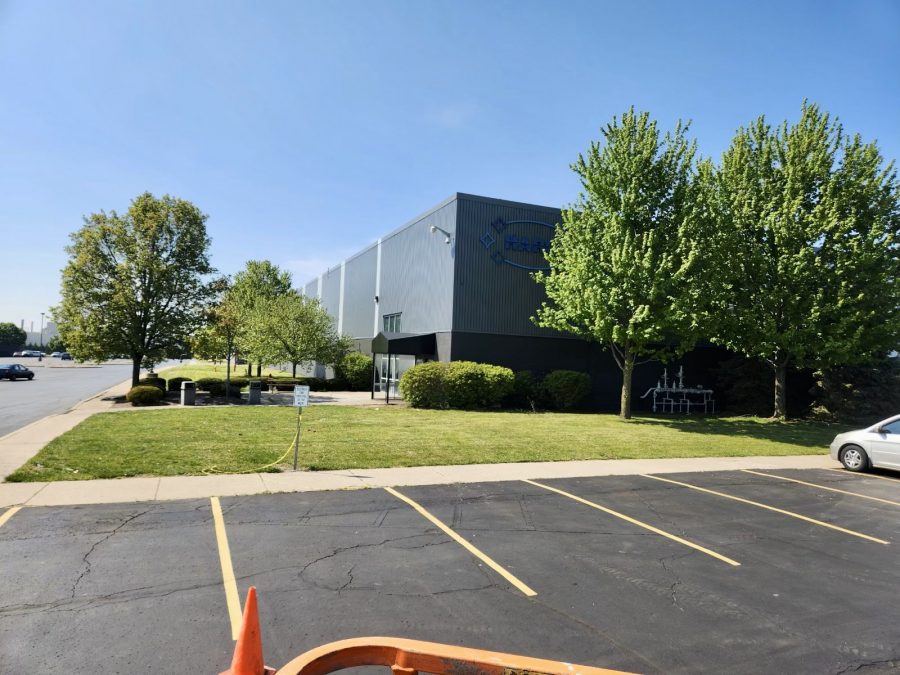 exterior of painted industrial building and parking lot Preview Image 6