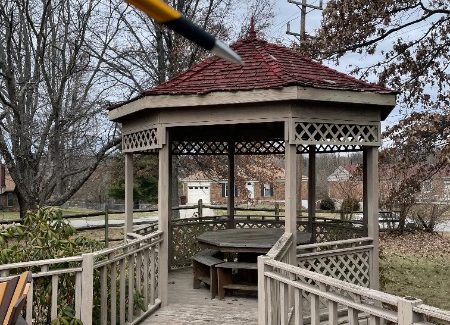 worn gazebo with damage