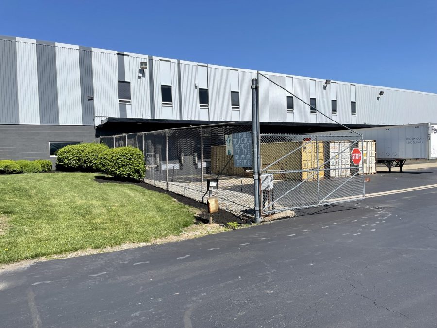 exterior of painted industrial building and parking lot Preview Image 9