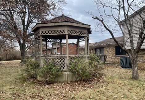 worn gazebo with damage