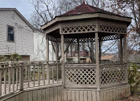worn gazebo with damage
