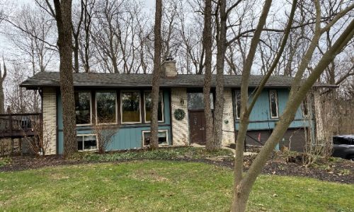 Front of Home Before Painting