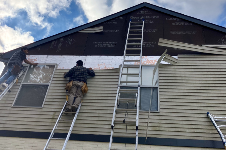 Florence Exterior Home project view of siding being prepared and painted Preview Image 7