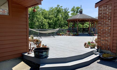 Repaired, Stained and Painted Deck & Siding