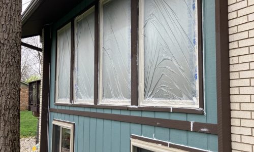 Side of Home Before Painting