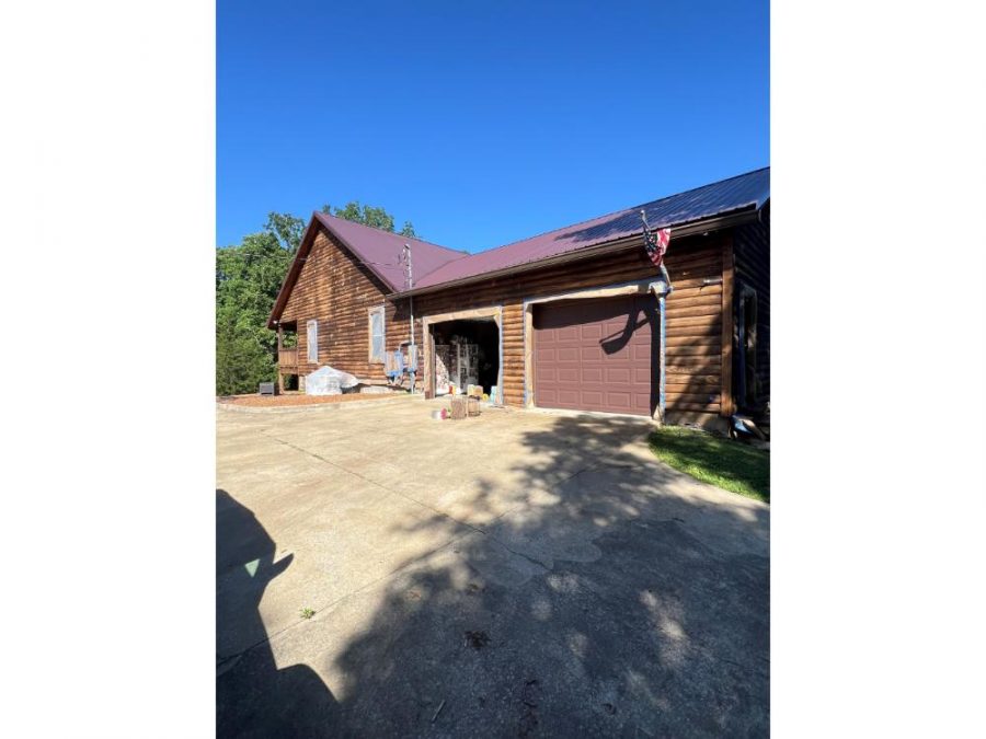 photo of cabin being repainted Preview Image 5