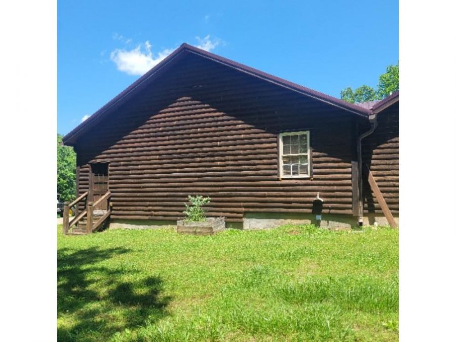 photo of cabin being repainted Preview Image 6