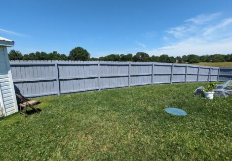 photo of fence being repainted