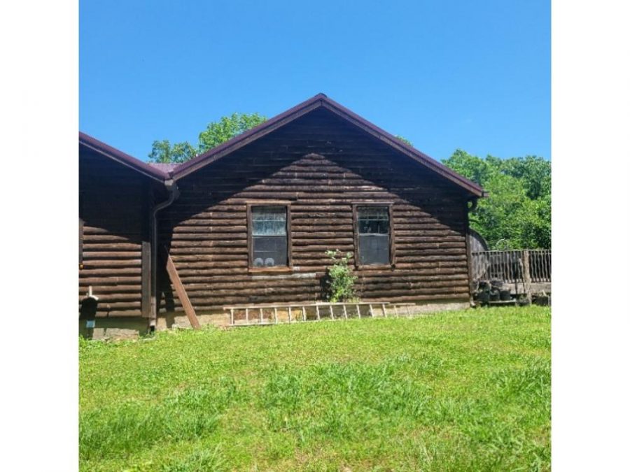 photo of cabin being repainted Preview Image 1