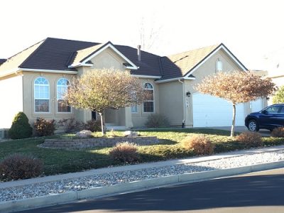 Exterior house painting by CertaPro painters in Broadmoor Bluffs, CO