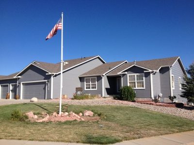 Exterior painting by CertaPro house painters in Peyton, CO